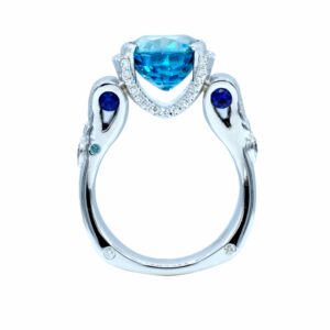 platinum blue zircon ring accented with sapphires and diamonds