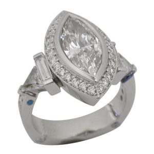 platinum marquise cut diamond halo engagement ring with baguette cut in trilliant diamonds