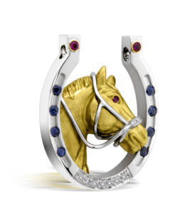platinum and 18kt horse and horseshoe pendant with ruby sapphires and diamonds