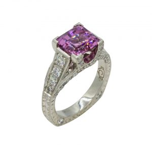 square pink spinel and diamond cathedral ring with hand engraving