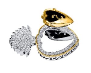 platinum and 18kt yellow gold flaming heart locket accented with round brilliant diamonds and filigree