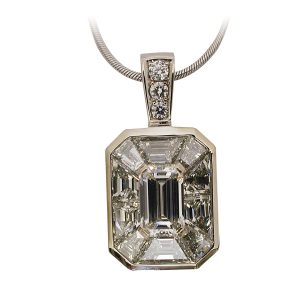 platinum emerald cut diamond and baguette cut invisible set pendant with round brilliant diamonds